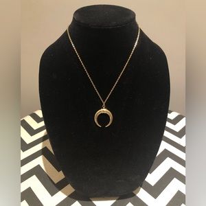 Gold coloured arch necklace